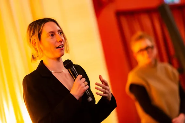 Brydie O'Connor speaking during a Q&A in Berlin