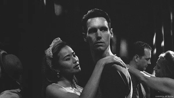 Jamie Chung and Cory Michael Smith in 1985