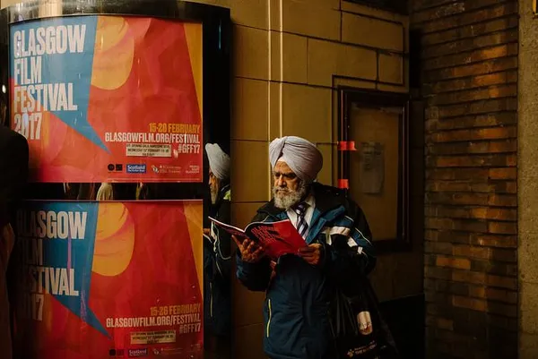 Film fan reads programme