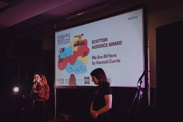 We Are All Here receiving a Glasgow Short Film Festival award