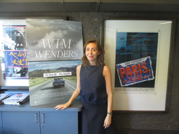 Anne-Katrin Titze with a Paris, Texas poster