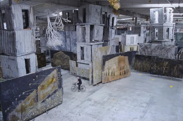 Anselm Kiefer riding his bicycle in Anselm