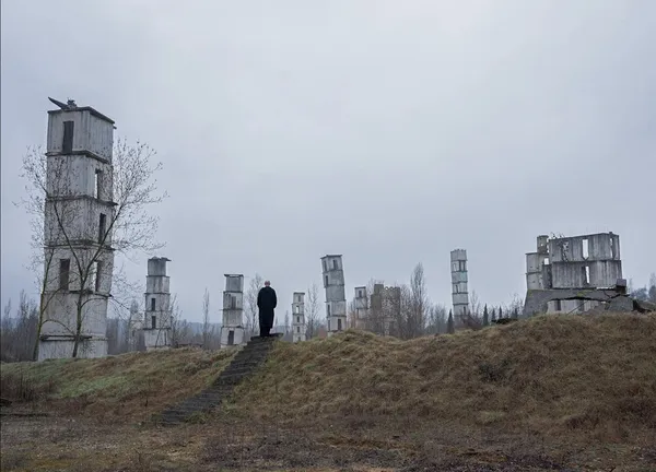 Anselm Kiefer on the hill with his artwork