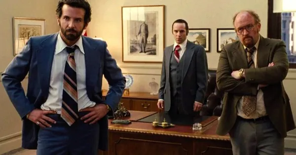 Alessandro Nivola with Bradley Cooper and Louis CK in American Hustle
