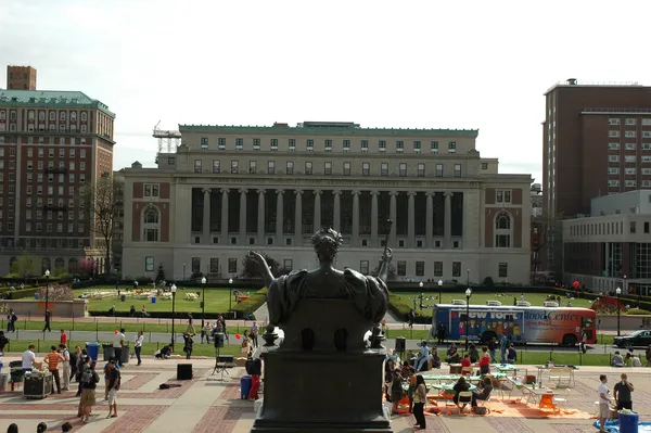 Columbia University. A large building decorated with columns and inscribed with the names of some of the better known Ancient Greek philosophers.