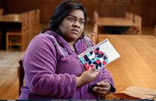 Oscar, Golden Globe, and BAFTA winner Da'Vine Joy Randolph as Mary Lamb with the Meditations book created by Nate Carlson for The Holdovers