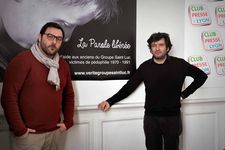 Denis Ménochet and Éric Caravaca in front of a La Parole Libérée poster: “I discovered François was very important, he created the association …”