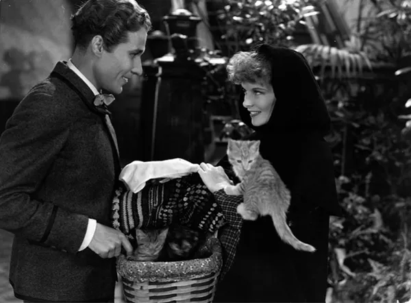 Katharine Hepburn with Douglass Montgomery and kittens in Little Women