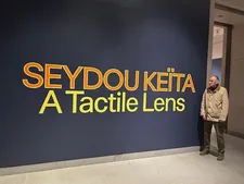 Ed Bahlman at the Seydou Keïta: A Tactile Lens exhibition at the Brooklyn Museum