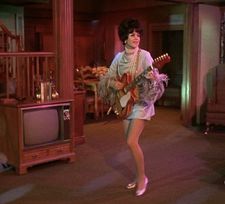 Elizabeth Montgomery as cousin Serena performing I'll Blow You a Kiss in the Wind in Bewitched