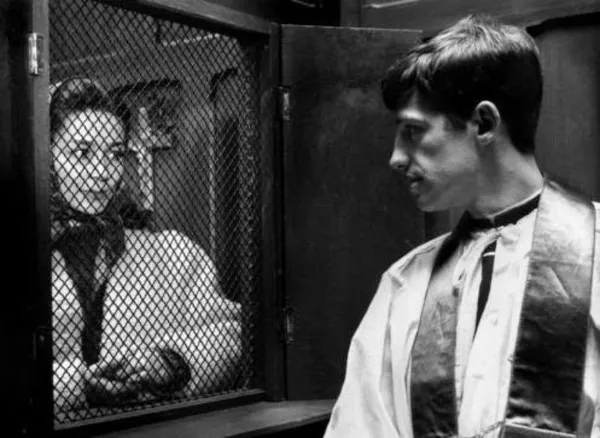 Emmanuelle Riva and Jean-Paul Belmondo in Léon Morin, Prêtre