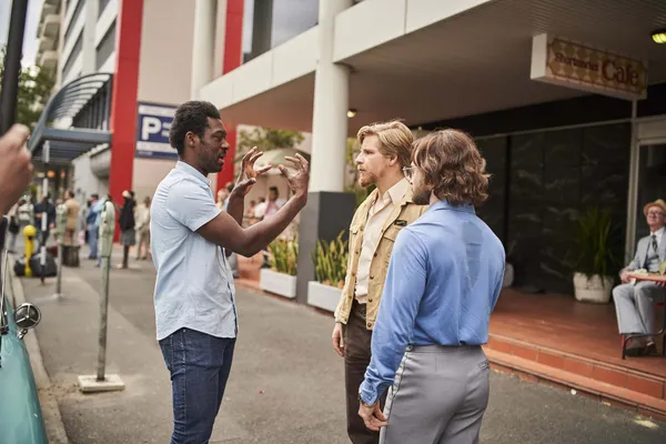 Francis Annan, Daniel Webber and Daniel Radcliffe on the set of Escape From Pretoria