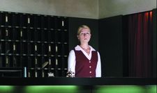 Irene (Franziska Weisz) at the reception desk in Hotel