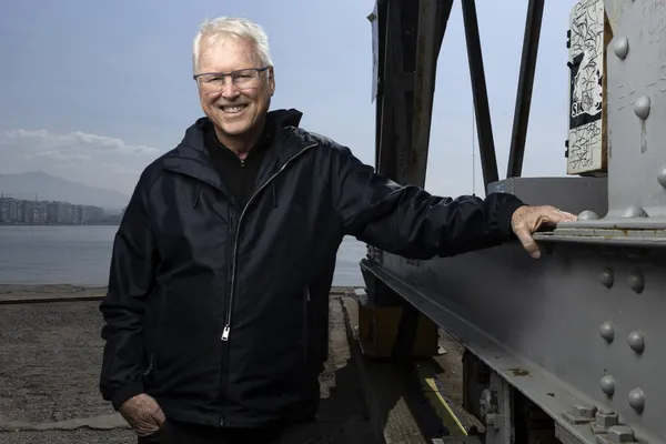 Tony Jones standing smiling