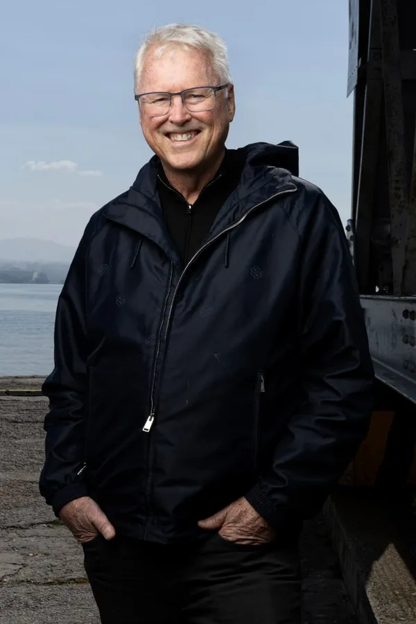 Tony Jones standing smiling