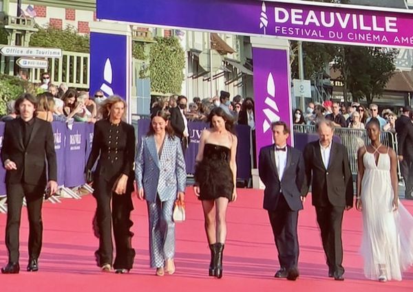 Striding out on Deauville’s red carpet: Charlotte Gainsbourg, centre in the little black dress, as jury president and her fellow jurors at last night’s opening ceremony