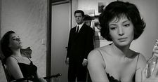 Lydia (Jeanne Moreau) in Biki dress with Giovanni (Marcello Mastroianni) and Valentina (Monica Vitti) in Valentino in La Notte