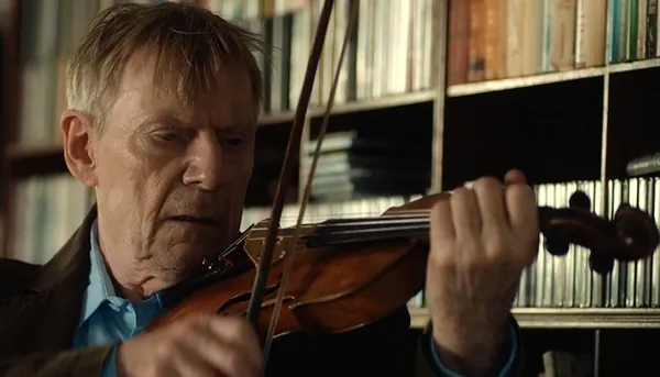 Jesper Christensen playing the violin