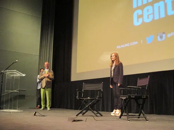 John Waters and Isabelle Huppert