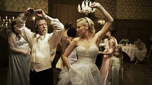 John Hurt with Kirsten Dunst in Melancholia