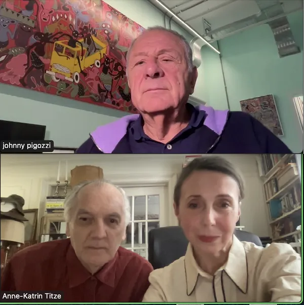 An older white man sits in front of a vividly coloured piece of modern art in one Zoom window; a middle-aged white woman and older white man sit in a pale room in another.