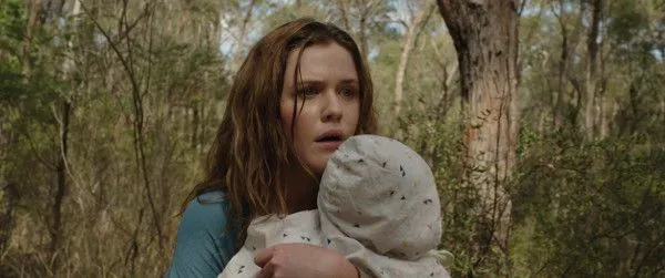 Harriet Dyer in Killing Ground - Ian and Samantha arrive at an isolated campsite to find an SUV and a tent—with no sign of the occupants. The discovery of a distressed child wandering in the woods unleashes a terrifying chain of events that will test the young couple's breaking point. 