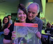 ESG producer and 99 Records founder Ed Bahlman gifts come away with ESG (99-003LP) to a surprised Kathleen Hanna