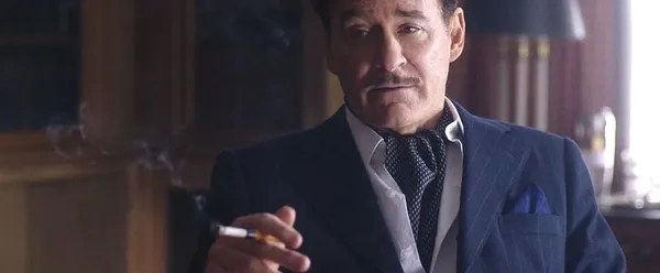 Kevin Kline as Errol Flynn