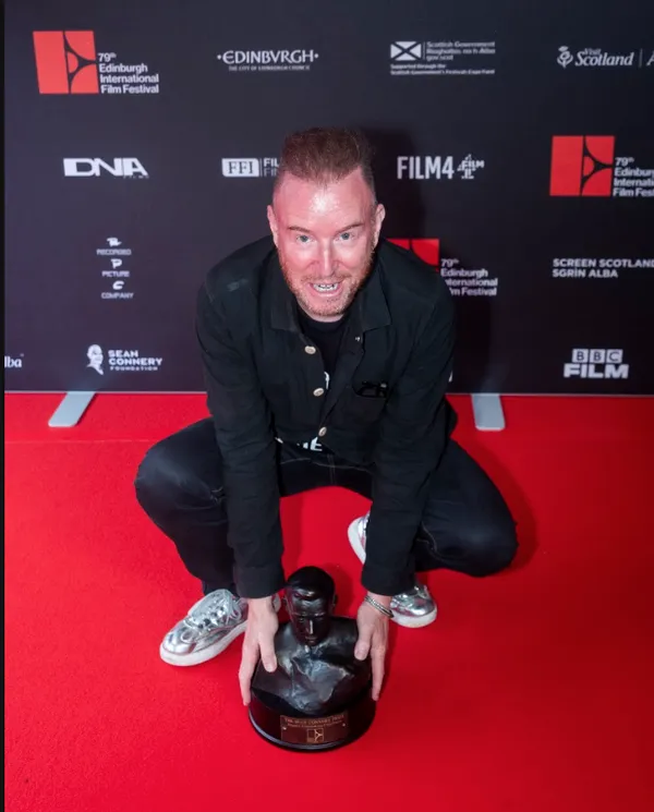 Kieron J Walsh on the red carpet with Sean Connery prize