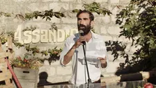 Mario (Marco Zucca) introducing the opening of their agritourism business in Assandira