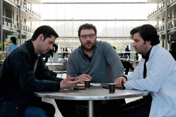 Melvil Poupaud, Denis Ménochet and Éric Caravaca in By The Grace Of God