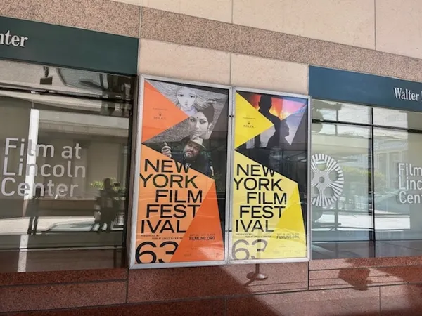 Posters for the New York Film Festival on the side of a building.