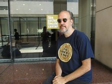 New York Film Festival Director Kent Jones in front of the Film Society of Lincoln Center logo from the past