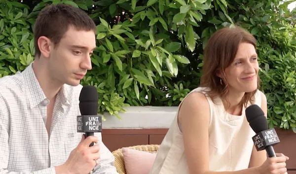 Théodore Pellerin and director Pauline Loquès talking to the press in Cannes