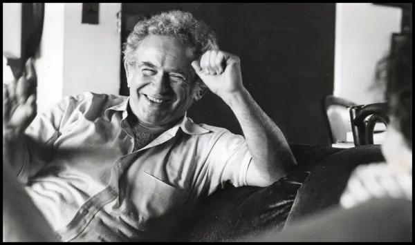 Norman Mailer laughing