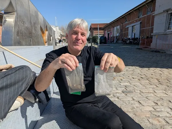Jon Larsen with his stardust hunting sample bags in Thessaloniki