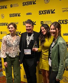 Phil Hopkins, Iliana Sosa and friends celebrating at SXSW