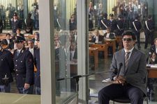 Pierfrancesco Favino as Tommaso Buscetta in the courtroom where the Maxi Trial took place