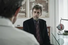 Carradori (Nanni Moretti) confronts Marco (Pierfrancesco Favino)