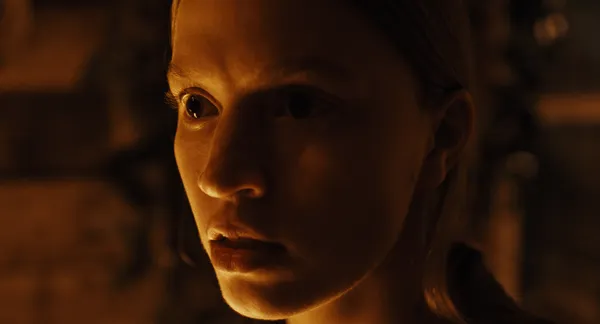 A still from the film Prime. A white woman looks nervous.