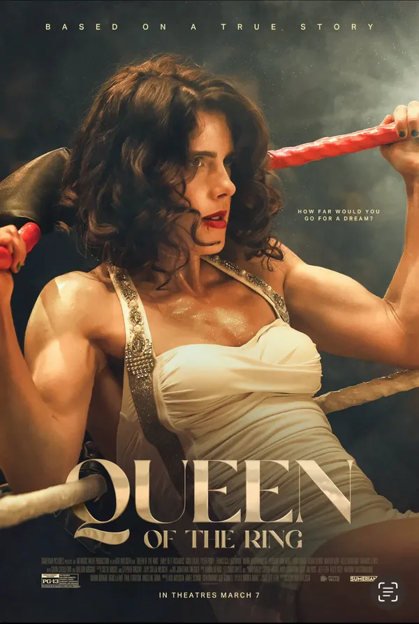 A poster for the film Queen Of The Ring, showing a sweaty, muscular white woman slumped against the side of a wrestling ring.