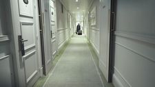 Robert Fripp walking down the hotel corridor of life