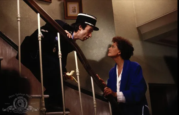 Roberto Benigni with Claudia Cardinale in Son Of The Pink Panther