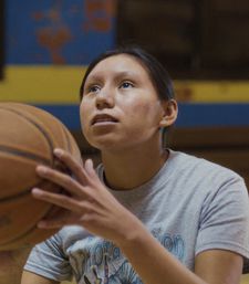 Sadie LaPointe as the basketball coach