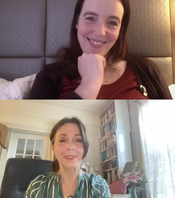 A younger white woman and a middle aged white woman, both with dark hair, appear in separate windows on a Zoom call.