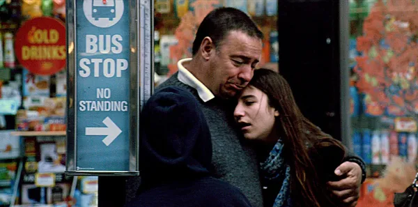 Street, comforting couple