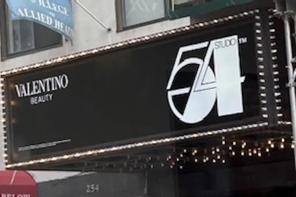 A sign over the entrace to a building reads 'Studio 54'.