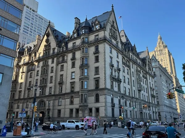 A large, eight storey late Victorian building on a New York street corner.