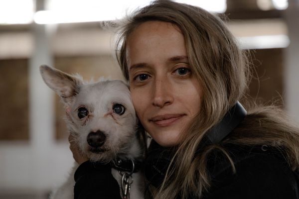 Kelsey Egan, director of The Fix and Glasshouse, with her dog, who also makes an appearance in The Fix