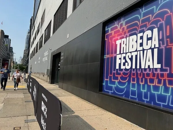 A colourful poster on one said of a sunny urban street bears the words 'Tribeca Festival'.